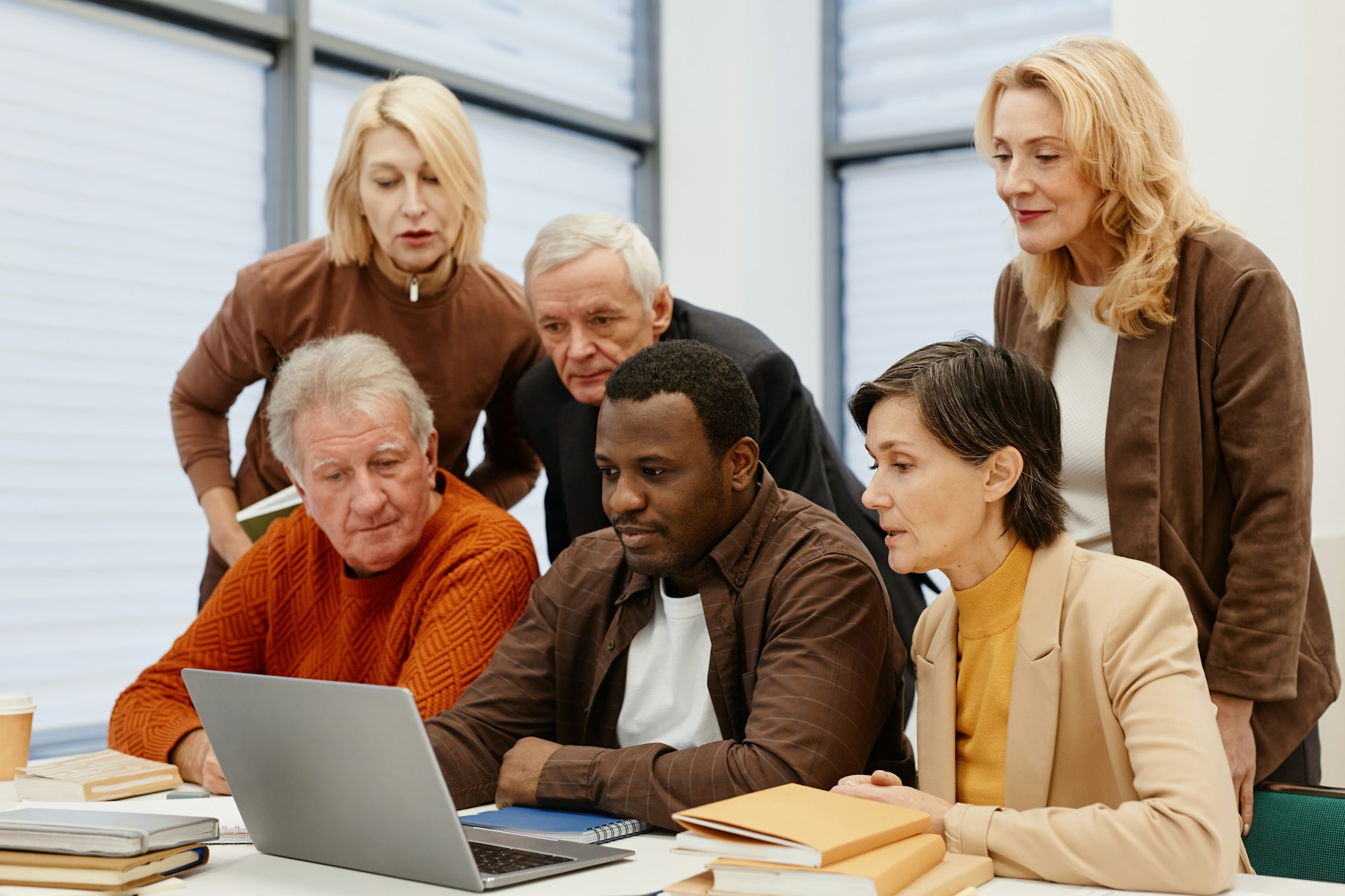 People learning the basics of computer technology