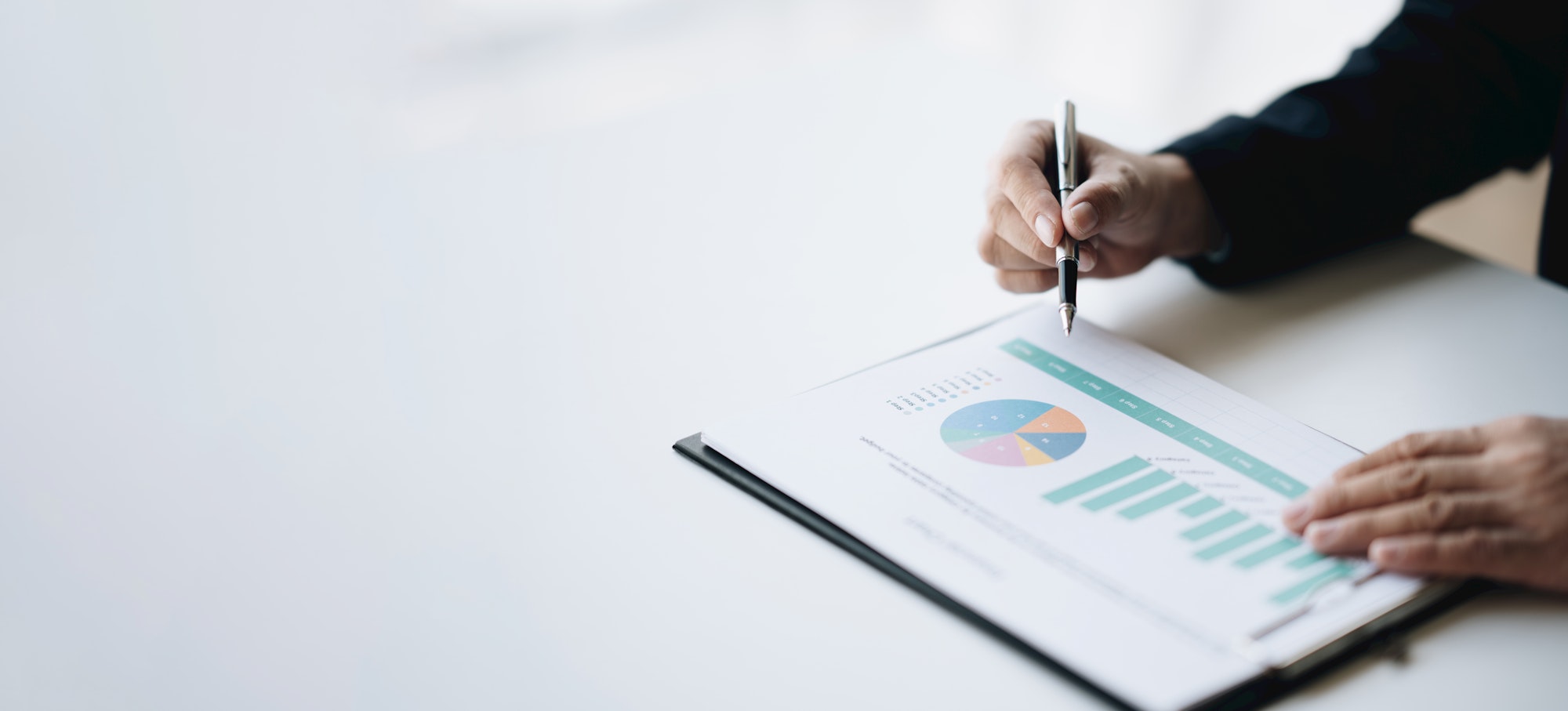 Professional businessman or investor looking at the company chart, trying to analyse the budget.