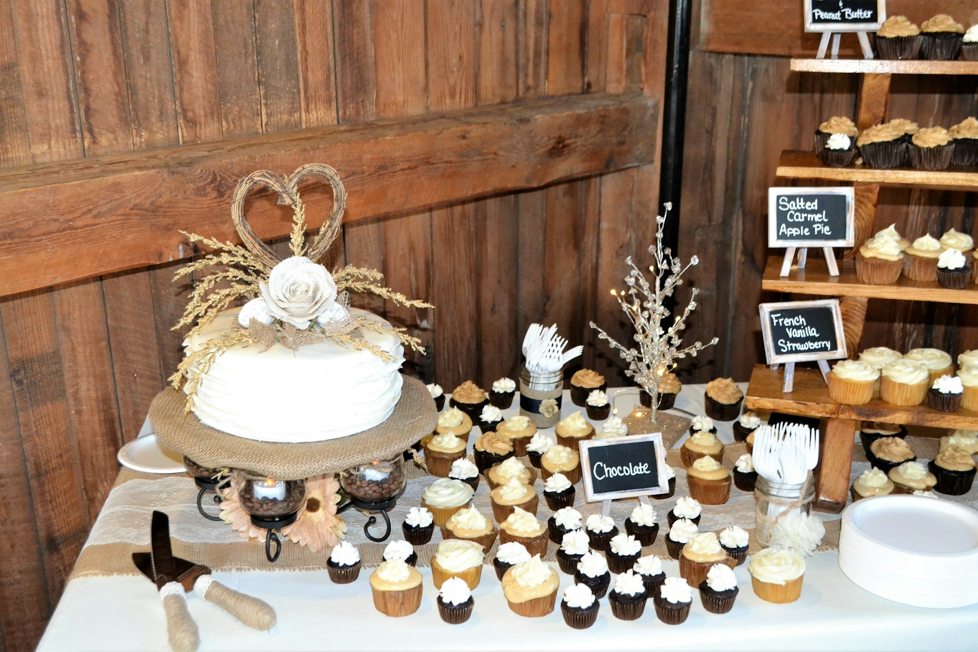 Wedding cake and cupcakes for a country wedding reception themed event